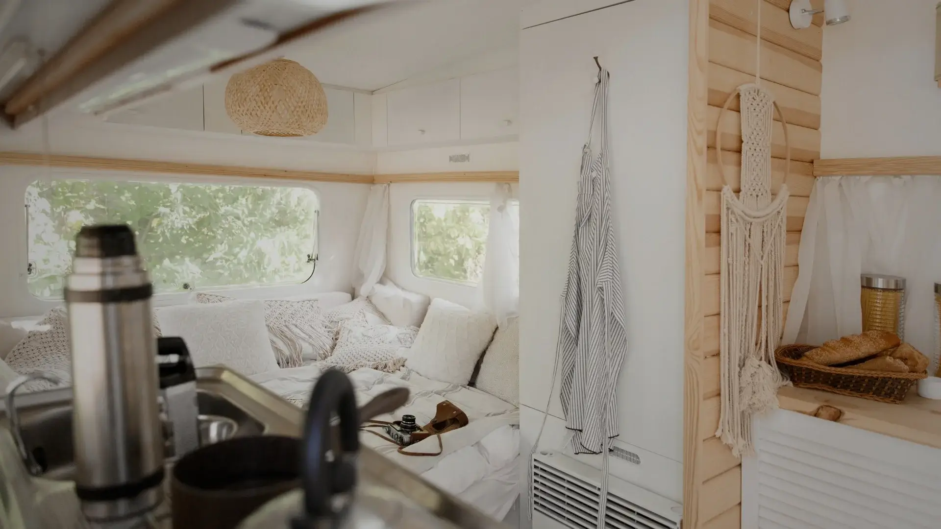 Bright, airy RV interior with bed