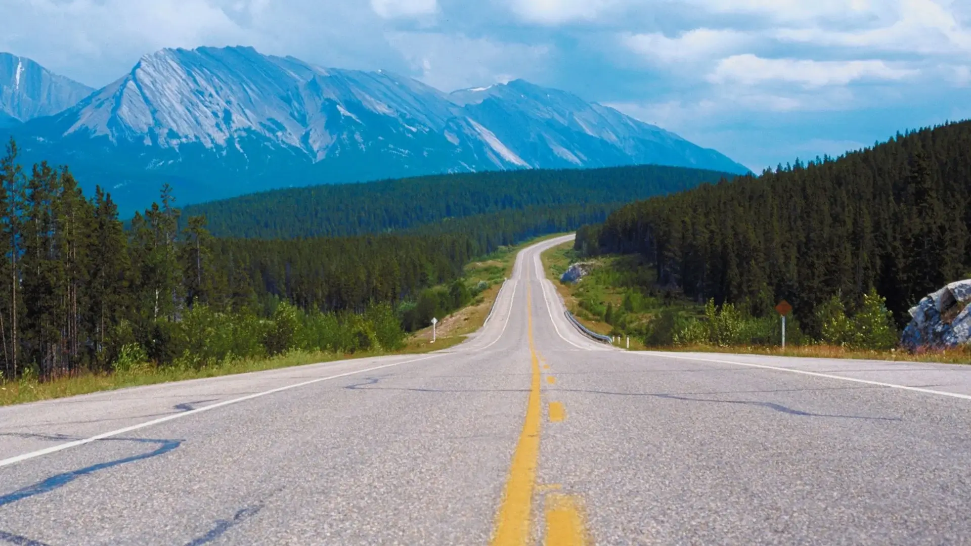 Road leading to mountains